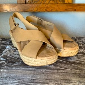 Women’s tan wedge sandals, size 7. Gently worn